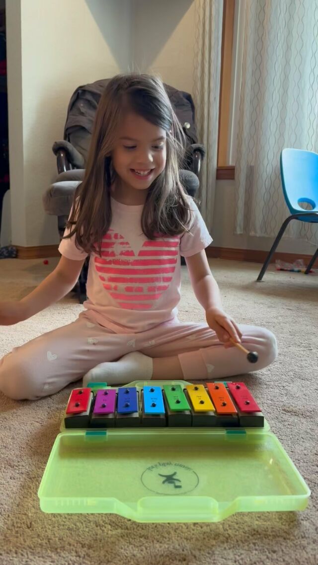My tiny musician singing her dinosaur song! #letsplaymusic
